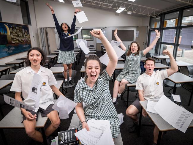 Students celebrate finishing the VCE exams. Picture: Jake Nowakowski