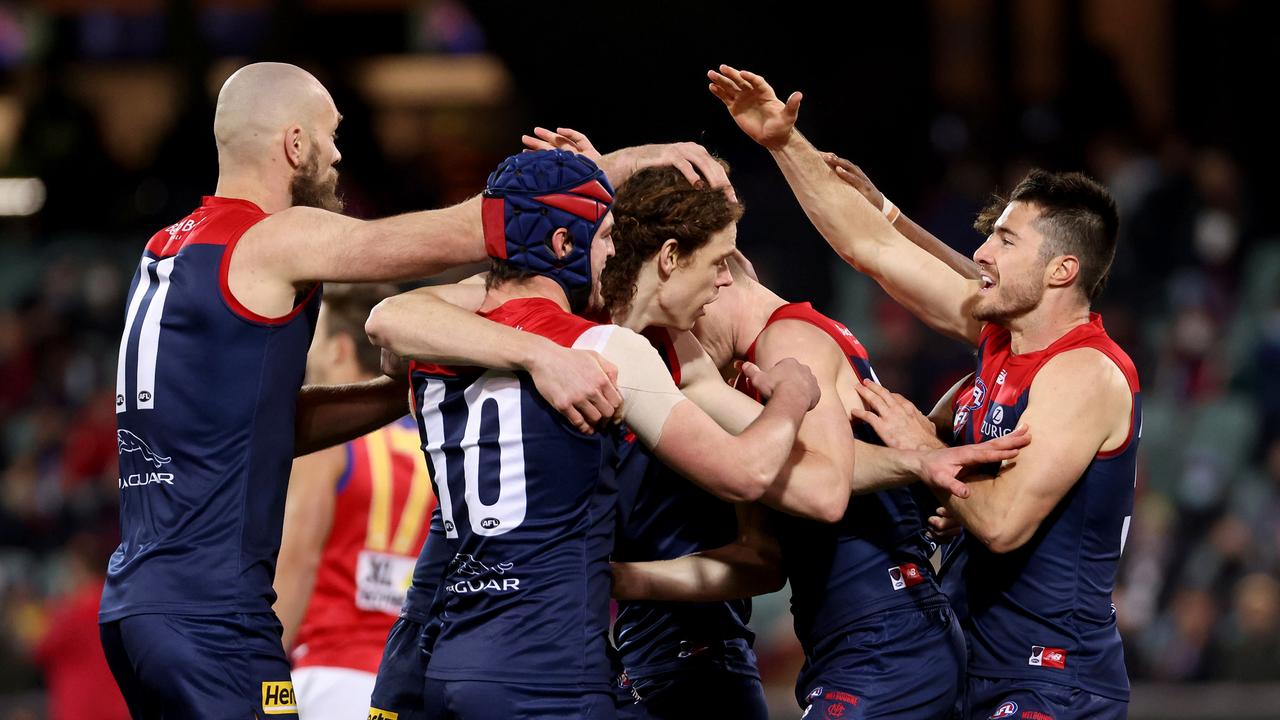 Brown’s teammates flock to him after slotting a goal against the Lions in their qualifying final win. Picture: James Elsby/AFL Photos via Getty Images