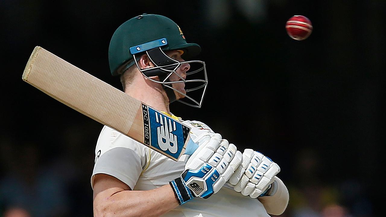 Steve Smith watches a bouncer fizz towards him.