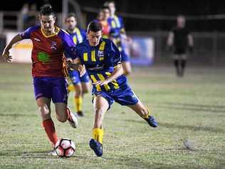 FINALS BOUND: Joshua Advaneyof the KSS Jets and Noah Bray of Across the Waves compete for the ball. Picture: Cody Fox