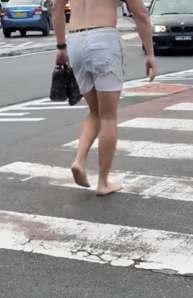 A Bondi local seen walking across a zebra crossing, not caring about the safety risks it could pose. Picture: TikTok