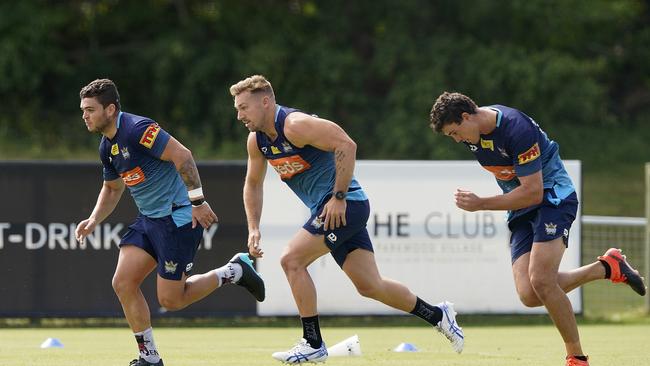 Bryce Cartwright, centre, is one of the players to be stood down. Picture: AAP