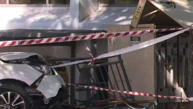 A woman has allegedly tried to run a man down before crashing her car onto a busy North Adelaide footpath. Picture: NINE NEWS