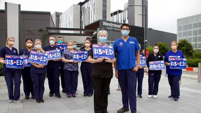 Timothy Blofield (front) and NSW Nurses and Midwives' Association with nurses at Westmead Hospital in December.