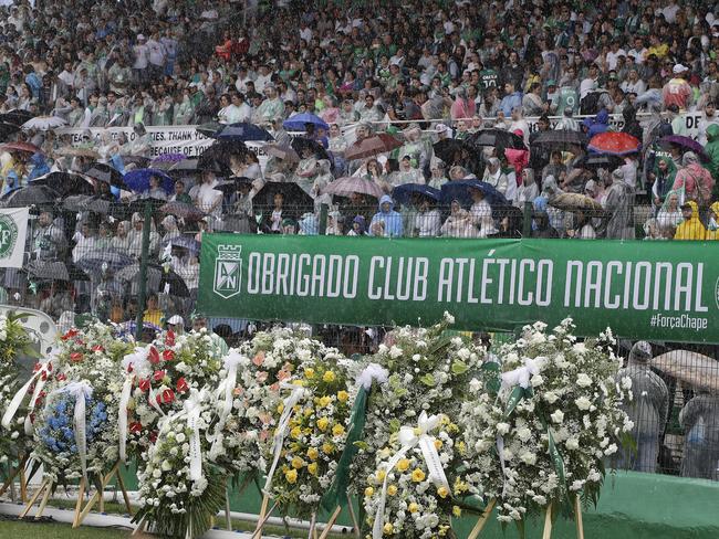 Chapecoense soccer fans attend a funeral ceremony in tribute for victims of the plane crash, which claimed the lives of many of the team’s members. Picture: AP Photo/Andre Penner