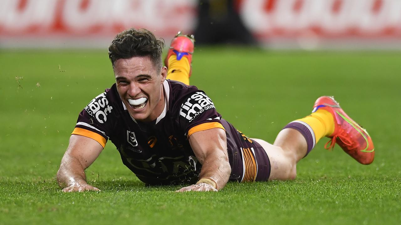 BRISBANE, AUSTRALIA - JULY 30: Brodie Croft of the Broncos scores a try during the round 20 NRL match between the Brisbane Broncos and the North Queensland Cowboys at Suncorp Stadium, on July 30, 2021, in Brisbane, Australia. (Photo by Albert Perez/Getty Images)
