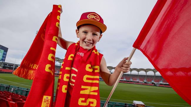 Suns fan, Finn Reynolds, 10, at Metricon Stadium, Carrara. Picture: Jerad Williams.