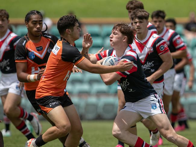 Michael Boustany makes a tackle. Picture: Julian Andrews