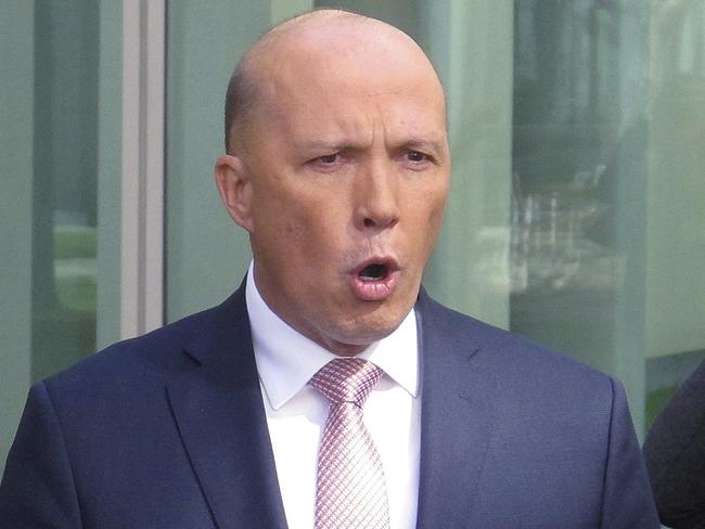 Former Australian Cabinet minister Peter Dutton addresses the media at Parliament House in Canberra on Monday, Picture: Rod McGuirk/AP