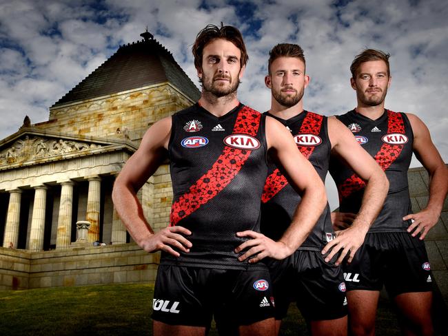 Jobe Watson, Cale Hooker and Tom Bellchambers ahead of last year’s Anzac Day clash. Picture: Tony Gough