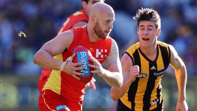 Gary Ablett clears from the stoppage against Hawthorn. Picture: Michael Klein