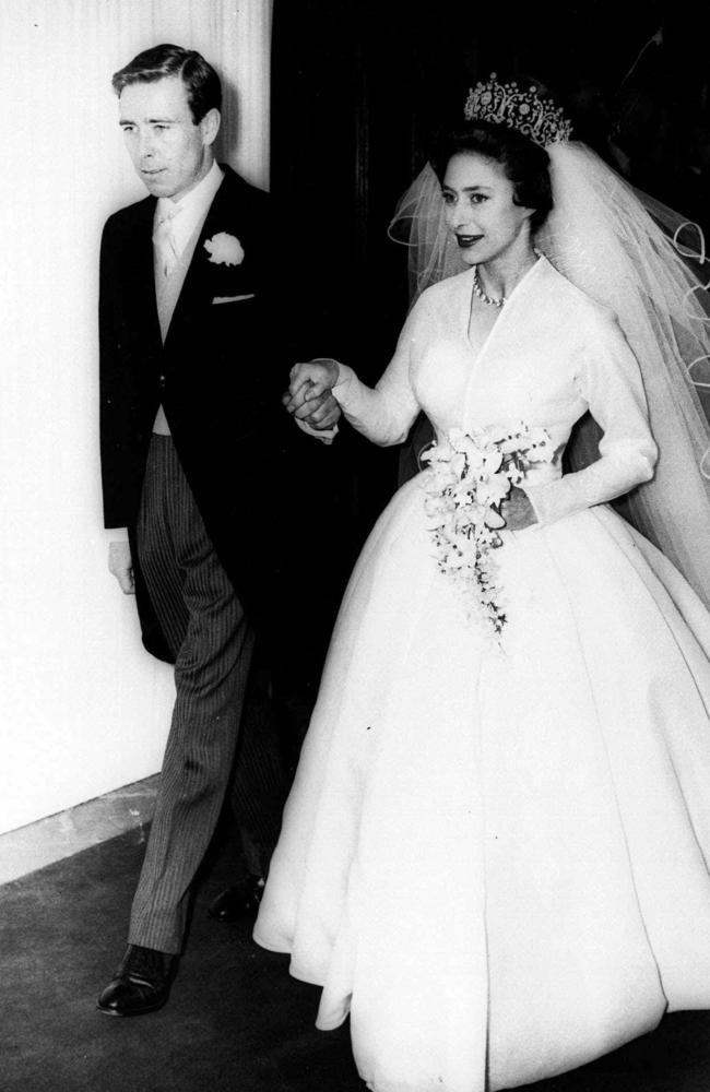 May 06, 1960: Antony (Tony) Armstrong-Jones holds the hand of his bride, Princess Margaret as they leave London's Westminster Abbey after their wedding.