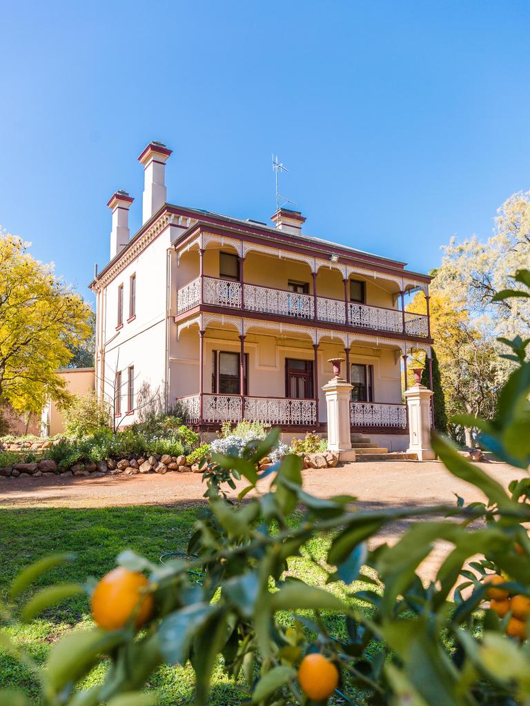 The house has been designed to suit the hot climate, with cement rendered brick walls, slate roof, verandas and balconies. Photo: Chloe Smith.