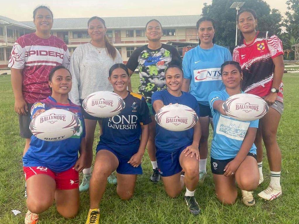 Female Tongan rugby players received new balls from Queensland Rugby Union. Picture: Supplied
