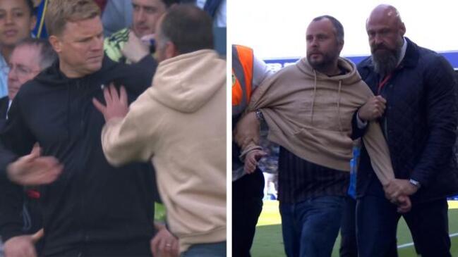 Pitch invader squares up to Eddie Howe!