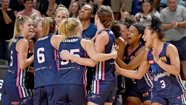 Adelaide Lightning players celebrate their semi-final clean sweep against Melbourne Boomers at Titanium Security Arena. Picture: Naomi Jellicoe