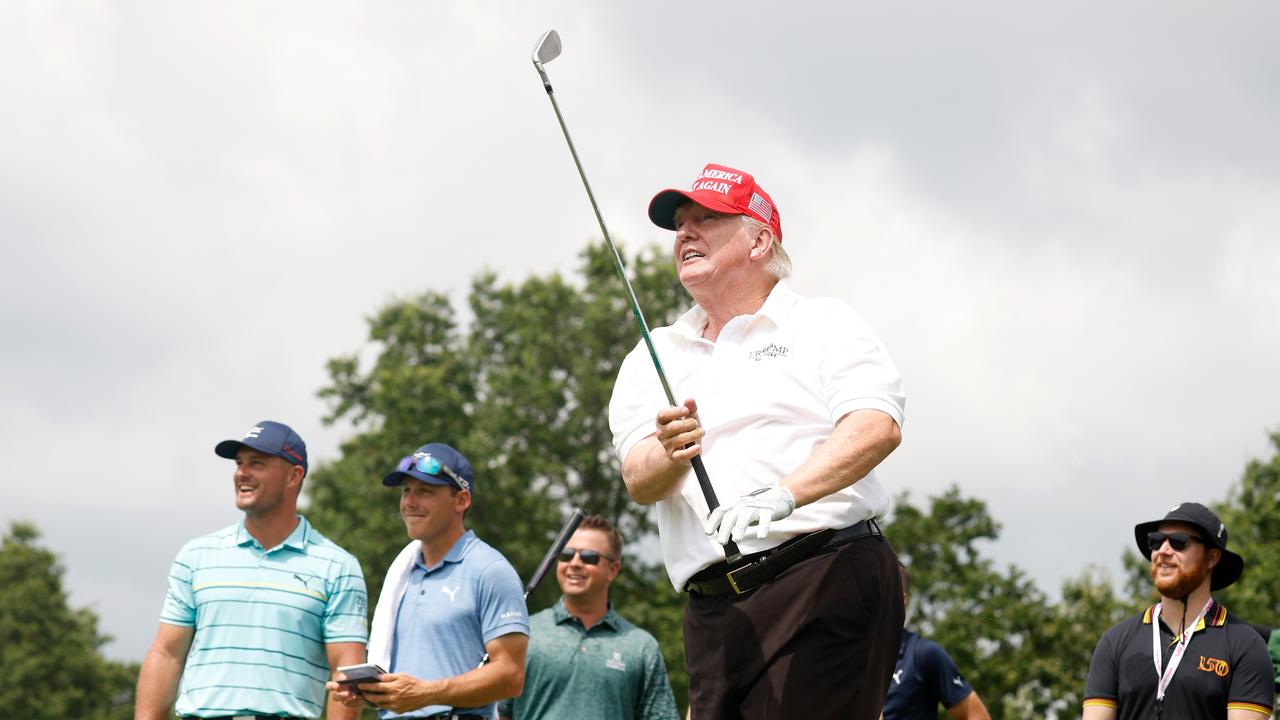 Donald Trump tees off. Photo: Cliff Hawkins/Getty Images/AFP