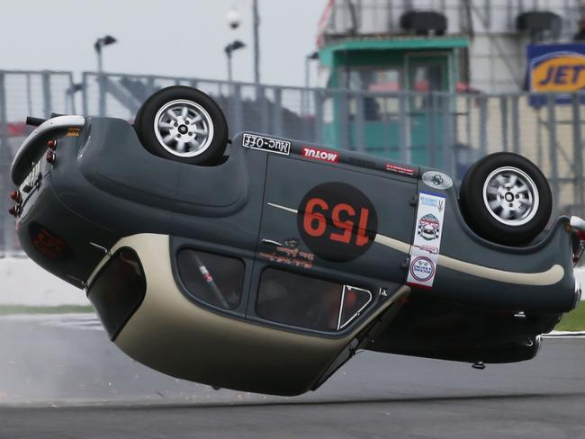 Strife of Brian... Former AC/DC rocker Brian Johnson rilling his vintage Austin A35. Picture: Splash News