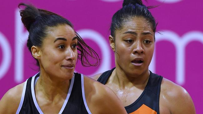 Kristiana Manu'a, right, guarding Maria Folau, wife of rugby player Israel Folau.