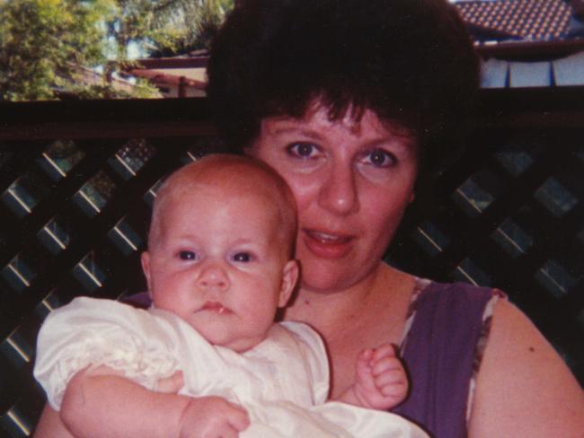 Kathleen Folbigg with her baby daughter Sarah at her naming ceremony. Sarah died 30 Aug 1993 - crime NSW murder manslaughter -  Mother Kathleen 35, was found guilty 21/5/03 of murdering of her four children over ten years - child victims Caleb, Laura and Patrick