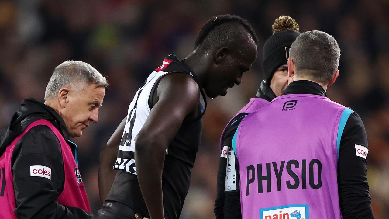 Port Adelaide defender Aliir Aliir was cleared to play on despite appearing dazed after a heavy collision with teammate Lachie Jones in the Showdown. Picture: Sarah Reed / Getty Images