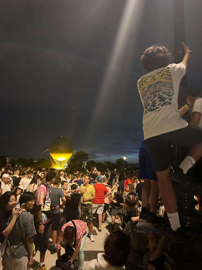 Thousands of people have been flocking to the Olympic cauldron every night.