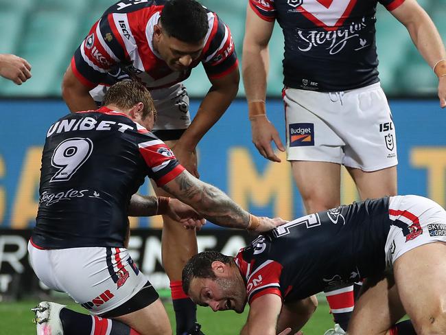 SYDNEY, AUSTRALIA - SEPTEMBER 12: Boyd Cordner of the Roosters reacts after a head knock during the round 18 NRL match between the Sydney Roosters and the Newcastle Knights at the Sydney Cricket Ground on September 12, 2020 in Sydney, Australia. (Photo by Cameron Spencer/Getty Images)