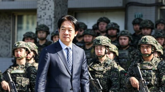 Taiwan’s President Lai Ching-te inspects troops during a visit to a military base. Picture: I-Hwa Cheng/AFP/Getty Images