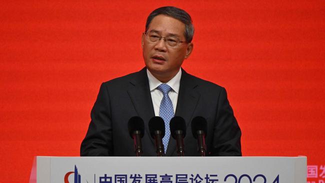 China's Premier Li Qiang delivers his speech at the China Development Forum in Beijing on March 24, 2024. (Photo by Pedro Pardo / AFP)