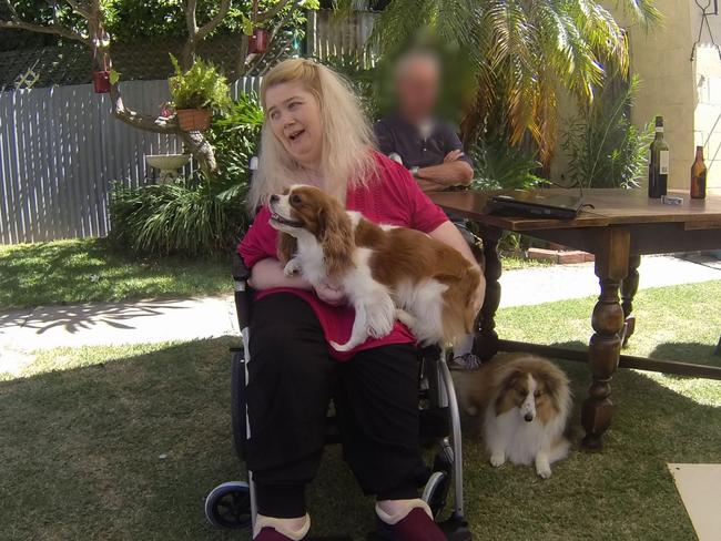 Ann Marie Smith  happy at a social occasion in 2011 , with her dogs Maggie( Collie ) and Deana . Picture: SAPOL