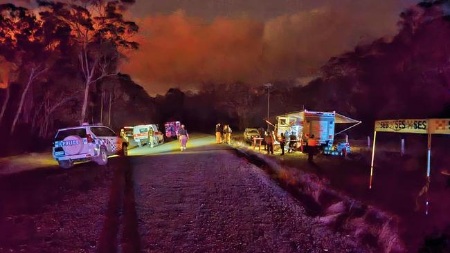 Fire crews continued working through the night to bring a bushfire at Deepwater under control. Photo: Mark Murphy