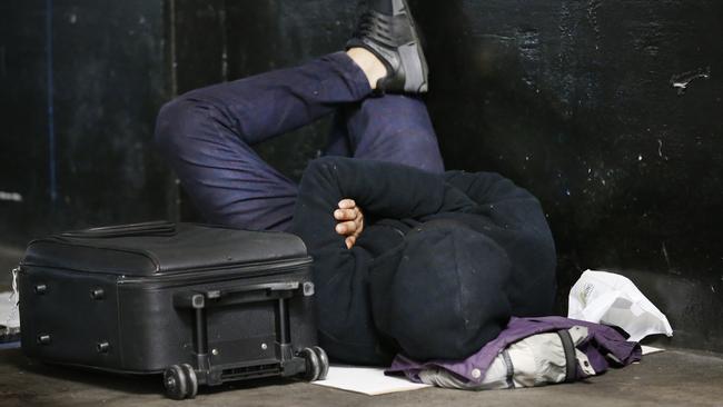 A rough sleeper in Melbourne CBD. Picture: David Caird