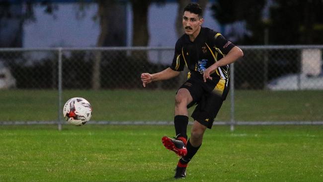 Mudgeeraba defender Luigi Tassone.