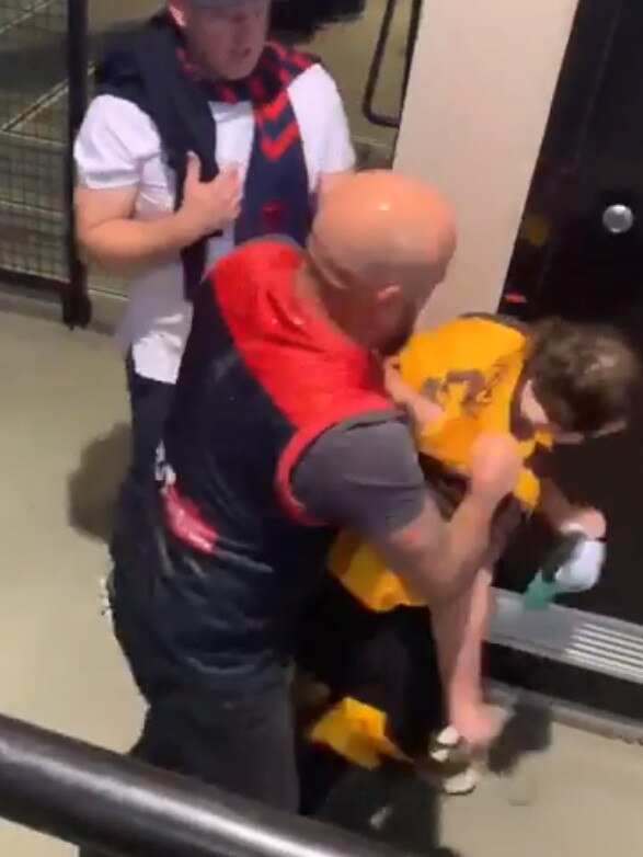 A disabled Hawthorn fan was punched. Picture: Channel 9.