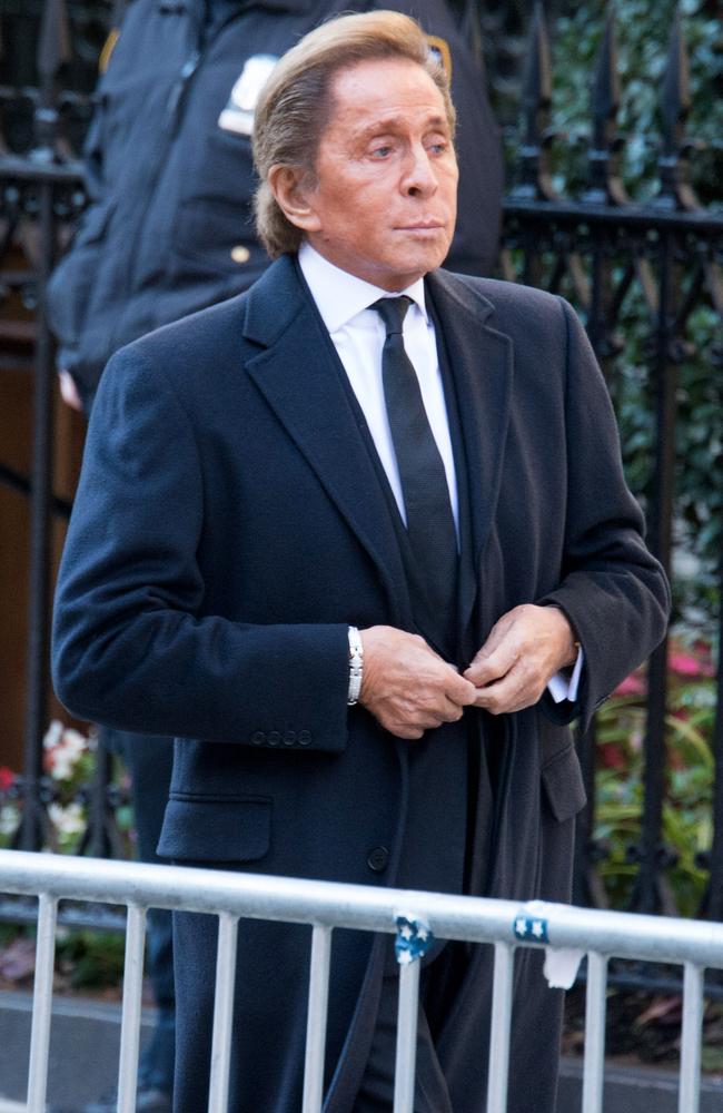 Designer Valentino arrives at the funeral of fashion designer Oscar De La Renta.