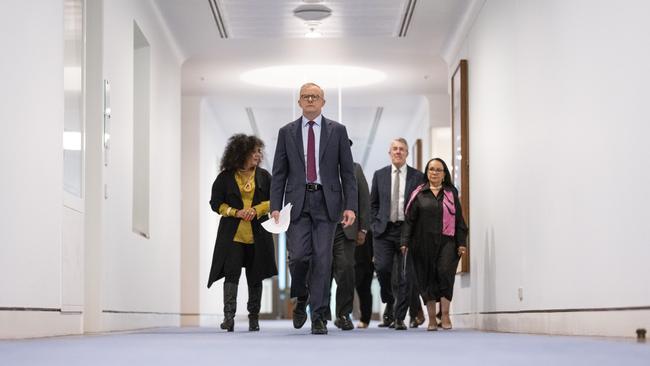 Anthony Albanese walks to Thursday’s press conference with members of the Referendum Working Group. Picture: NCA NewsWire / Martin Ollman