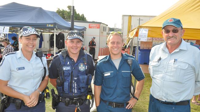 Bowen Police constables Jael Jackwitz and Corey Bradford and Bowen Ambulance Station's Jack Vandenheuvel and Gene Curtis looking after the revellers at the Bowen Fishing Classic and Wet Weekend in 2014.