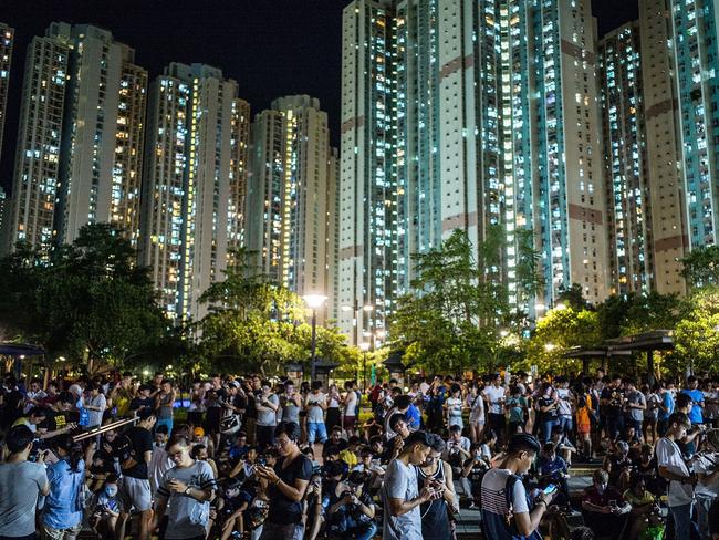 Pokemon Go gathers a large crowd at a park in Tin Shui Wai, Hong Kong. Picture: Getty