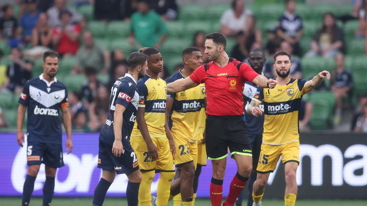 Ronald Barcellos of the Mariners is shown a red card. Photo by Daniel Pockett/Getty Images.