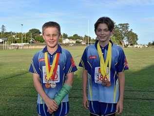 MEDAL HAUL: Cooper Laycock won silver in shot put and bronze in discus and Levi Bourke won two bronze medals for 100m and 200m at the Little A State Championships. Picture: Bec Singh