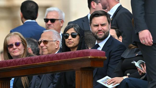US Vice-President JD Vance, right, and his wife Usha Vance, second right, attend the mass in St Peter’s Square. Picture: AFP