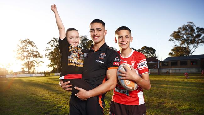 Wests Tigers player Tallyn Da Silva with sister Peyton and brother Kyle ahead of his first grade debut. Picture: Richard Dobson