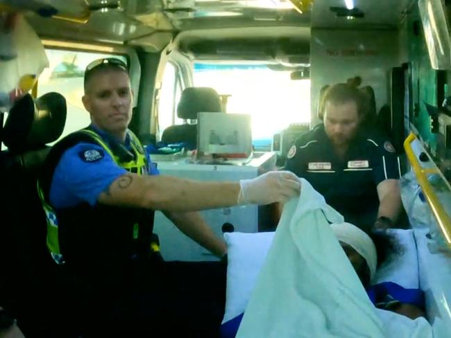 Cleo Smith’s alleged kidnapper in the back of an ambulance. Picture: Simon Hydzik/7NEWS