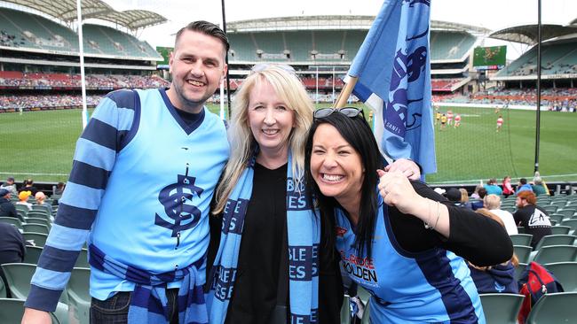 Sturt supporters LtoR: Simon Wilkins of Mawson Lakes, Lisa Whitman of Craigburn Farm and Kristie Wilkins of Mawson Lakes, before the game. 2016 SANFL Grand Final Colour. Eagles v Sturt, at Adelaide Oval. 25/09/16 Picture: Stephen Laffer