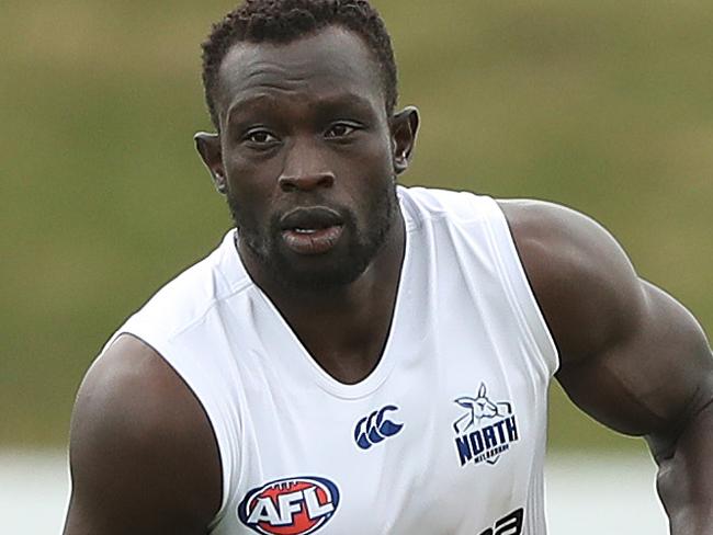 MELBOURNE, AUSTRALIA - DECEMBER 06: Majak Daw of the Kangaroos runs with the ball during a North Melbourne Kangaroos AFL training session at Arden Street Ground on December 06, 2019 in Melbourne, Australia. (Photo by Robert Cianflone/Getty Images)