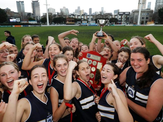 MELBOURNE, AUSTRALIA - JULY 28: Caulfield Grammar players celebrate during the 2022 Herald Sun Shield Senior Girls Grand Final match between Caulfield Grammar and Rowville Secondary at the ETU Stadium on July 27, 2022 in Melbourne, Australia. (Photo by Dylan Burns/AFL Photos via Getty Images)