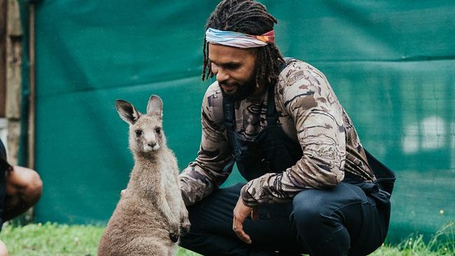 Patty Mills and friends helped rebuild the East Lynne animal shelter after the bushfires. Pic Luke Currie-Richardson