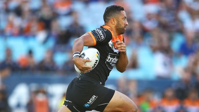 SYDNEY, NEW SOUTH WALES — MARCH 10: Benji Marshall of the Tigers runs the ball during the round one NRL match between the Wests Tigers and the Sydney Roosters at ANZ Stadium on March 10, 2018 in Sydney, Australia. (Photo by Mark Kolbe/Getty Images)