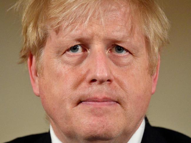 (FILES) In this file photo taken on March 19, 2020 Britain's Prime Minister Boris Johnson addresses a news conference to give a daily update on the government's response to the novel coronavirus COVID-19 outbreak, inside 10 Downing Street in London. - British Prime Minister Boris Johnson was discharged from hospital on April 12, 2020, a Downing Street spokesman said, a week after being admitted for treatment for coronavirus and spending three days in intensive care. 