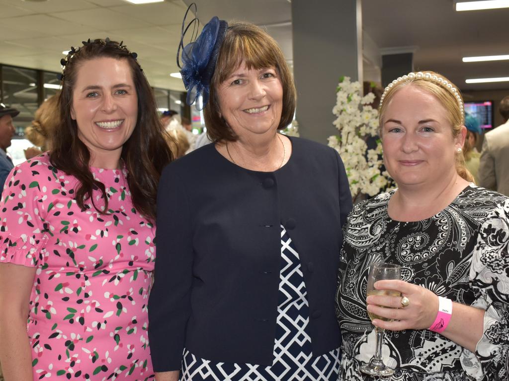 Alanna O'Connor, Marina Wall and Sharon Critch at The Archer race meeting at Callaghan Park, Rockhampton, on May 7, 2022.